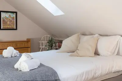 Un ou plusieurs lits dans un hébergement de l'établissement Travel Homes - The Parc, next to Champ de Mars