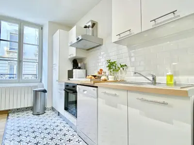 Cuisine ou kitchenette dans l'établissement Le convivial, appartement Centre ville Mulhouse