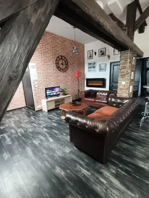 Télévision ou salle de divertissement dans l'établissement Cosy Lodg