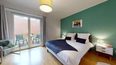 Un ou plusieurs lits dans un hébergement de l'établissement Le Nid Cosy + 1 Garage