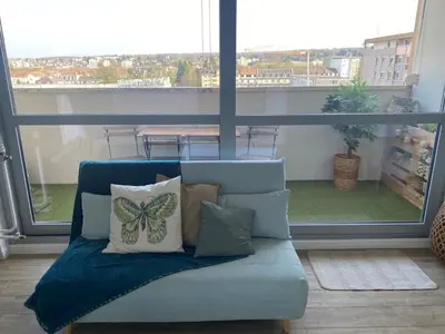Coin salon dans l'établissement Magnifique appartement au coeur de Mulhouse