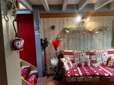 Un ou plusieurs lits dans un hébergement de l'établissement Chalet duplex avec terrasse entièrement équipé60m2