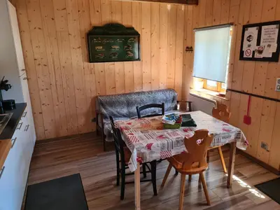 Coin salon dans l'établissement Le chalet du bois joli