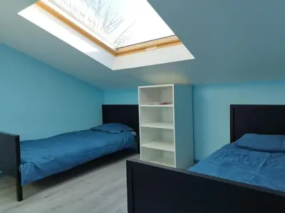 Un ou plusieurs lits dans un hébergement de l'établissement Appartement avec terrasse 6 personnes PAS DE FETE