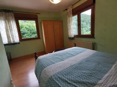 Un ou plusieurs lits dans un hébergement de l'établissement Gîte Saint Ludan