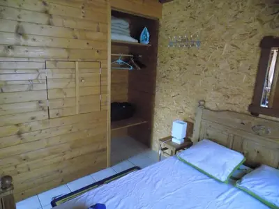 Un ou plusieurs lits dans un hébergement de l'établissement Le Chalet des Vosges