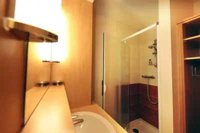 Salle de bains dans l'établissement Le Bucheron au cœur du massif des Vosges 3 étoiles