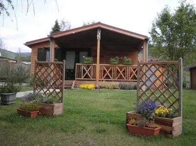 Jardin de l'établissement Chalet Confort Aloya