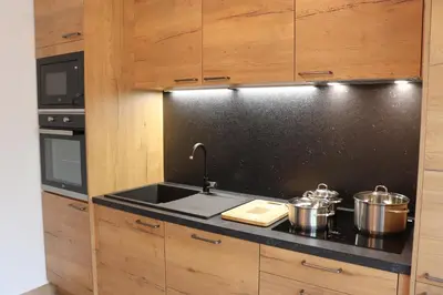 Cuisine ou kitchenette dans l'établissement Gîte les Pervenches avec Sauna