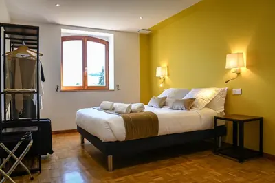 Un ou plusieurs lits dans un hébergement de l'établissement Grande maison de vacances L'Orée des Vignes