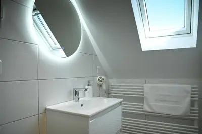 Salle de bains dans l'établissement Grande maison de vacances L'Orée des Vignes