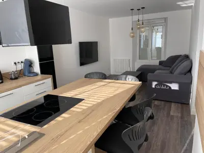 Télévision ou salle de divertissement dans l'établissement Le 33