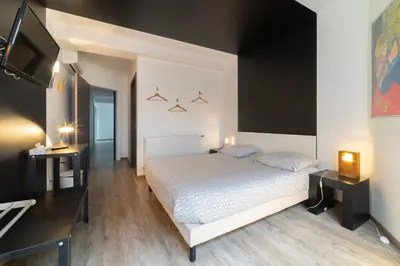 Un ou plusieurs lits dans un hébergement de l'établissement Maison Mondrian