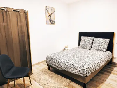 Un ou plusieurs lits dans un hébergement de l'établissement ⁂⁂ LE GRAND DUC Appartement [CLEDICIHOME] / Magnifique vue sur les montagnes / 4 KMs DE GERARDMER ! ⁂⁂