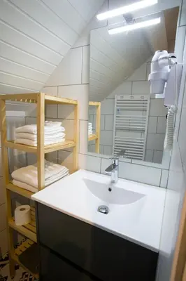 Salle de bains dans l'établissement Appartement Les Tournesols avec Climatisation