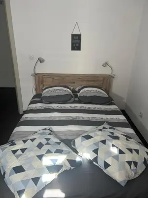 Un ou plusieurs lits dans un hébergement de l'établissement Le Nid Alsacien - Appartement cosy & lumineux à 10min de Colmar