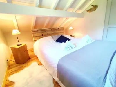 Un ou plusieurs lits dans un hébergement de l'établissement LES CIMES BLANCHES CLEDICIHOME Chalet 10 pers SPA & Grand terrain 4 MINUTES DES PISTES