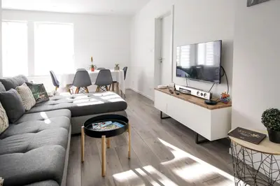Télévision ou salle de divertissement dans l'établissement L'instant T 4* Balnéo, Sauna et Parking Privé