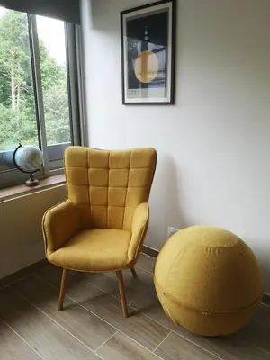 Coin salon dans l'établissement Le Petit Astro parking privé
