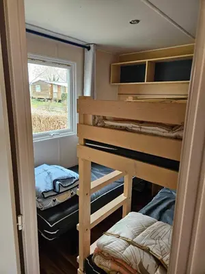 Un ou plusieurs lits dans un hébergement de l'établissement Mobil home 6 personnes Alsace