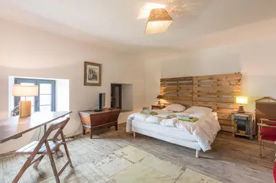 Un ou plusieurs lits dans un hébergement de l'établissement La Désirade Incroyable lodge typique dans les Vosges du Sud