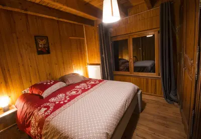 Un ou plusieurs lits dans un hébergement de l'établissement La Ferme des 3 lacs