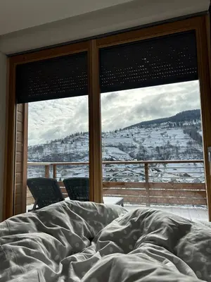 Un ou plusieurs lits dans un hébergement de l'établissement Magnifique appartement classé 4 étoiles avec Sauna et terrasse dans chalet