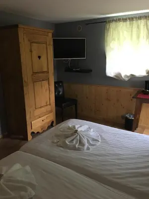 Un ou plusieurs lits dans un hébergement de l'établissement Hotel Elisabeth