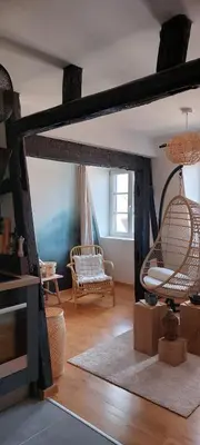 Coin salon dans l'établissement Appartement Le Verdoyant hyper centre avec Parking et Sauna