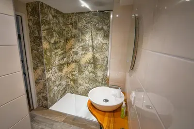 Salle de bains dans l'établissement Au Fil du Temps
