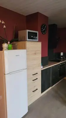 Cuisine ou kitchenette dans l'établissement Gîte à la ferme du Lomont