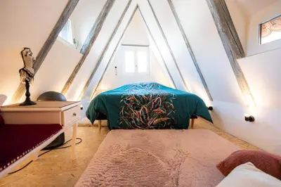 Un ou plusieurs lits dans un hébergement de l'établissement Appartement de la marquise - Designed by C.M