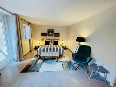 Un ou plusieurs lits dans un hébergement de l'établissement Zewwelatreppler - La Grange aux Petits Oignons - Chambre Rainette