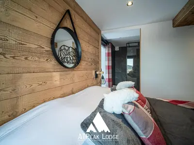 Un ou plusieurs lits dans un hébergement de l'établissement ATPeak Lodge Maison de Montagne d'exception