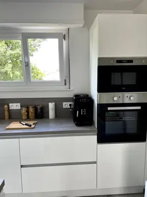 Cuisine ou kitchenette dans l'établissement Superbe appartement lumineux avec parking gratuit