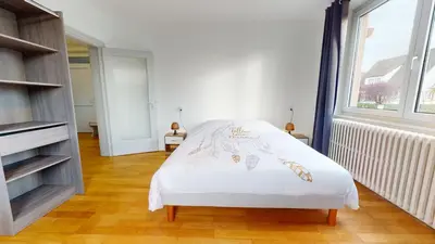 Un ou plusieurs lits dans un hébergement de l'établissement Appartement Le Passage - Ostheim
