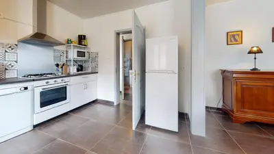 Cuisine ou kitchenette dans l'établissement La maison Blanche - Issenheim