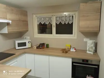 Cuisine ou kitchenette dans l'établissement Chez Vivi et Jean Pierre Maison 9 personnes au calme vue montagne WIFI