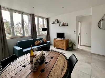 Coin salon dans l'établissement Appartement plain-pied au coeur de l'Alsace