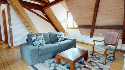 Coin salon dans l'établissement Les Appartements Manala - Turckheim