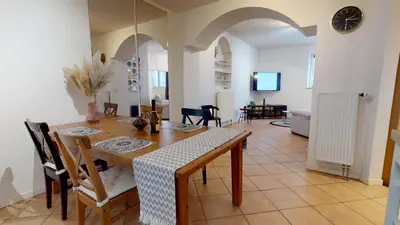 Coin salon dans l'établissement Magic Home - Les Taillandiers