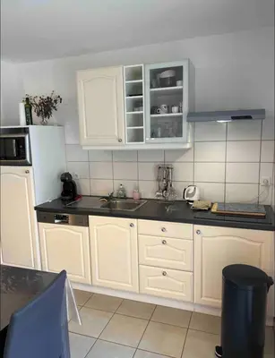 Cuisine ou kitchenette dans l'établissement Magnifique T3 avec balcon vue montagne , plein centre et proche du lac