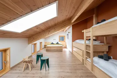 Un ou plusieurs lits dans un hébergement de l'établissement Chalet L'Urson, spacieux, jacuzzi, hammam et sauna