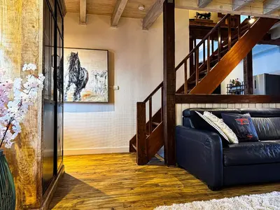 Coin salon dans l'établissement La Maison Rouge Au coeur historique de Riquewihr