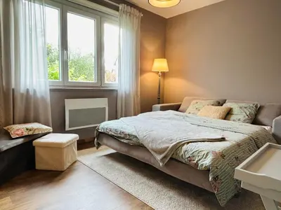 Un ou plusieurs lits dans un hébergement de l'établissement Aux Magnolias, Maison proche Colmar et Munster