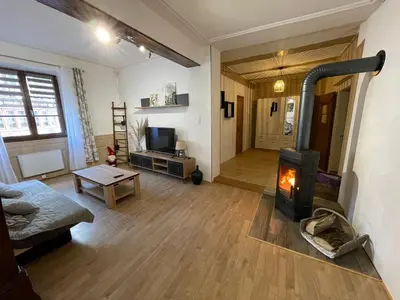 Télévision ou salle de divertissement dans l'établissement Gîte À l'aigle de sable