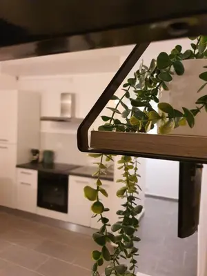 Cuisine ou kitchenette dans l'établissement CocooningSpace tout équipé + parking privé