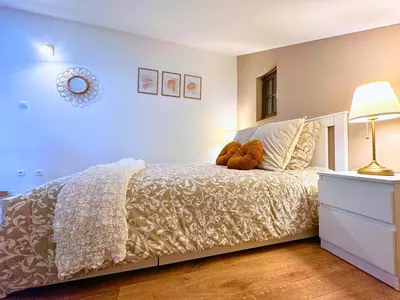 Un ou plusieurs lits dans un hébergement de l'établissement Le petit Châtaignier - Cozy Immo