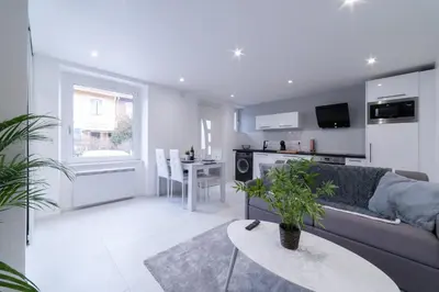 Cuisine ou kitchenette dans l'établissement LE ROYAL SWEET - PARKING GRATUIT + WIFI