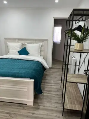 Un ou plusieurs lits dans un hébergement de l'établissement Colmar,appart chaleureux 2 pas centre avec jardin